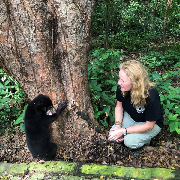 Founder Leslie Small with a Sumatran Sun Bear cub